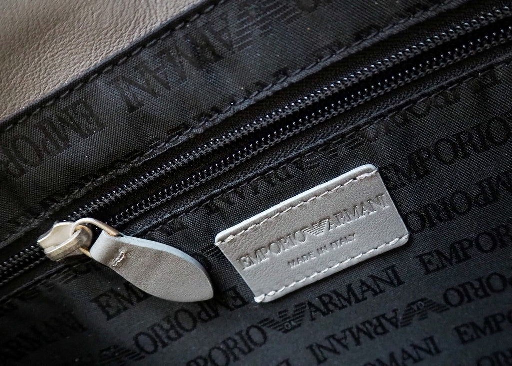 Emporio armani embossed discount logo messenger bag